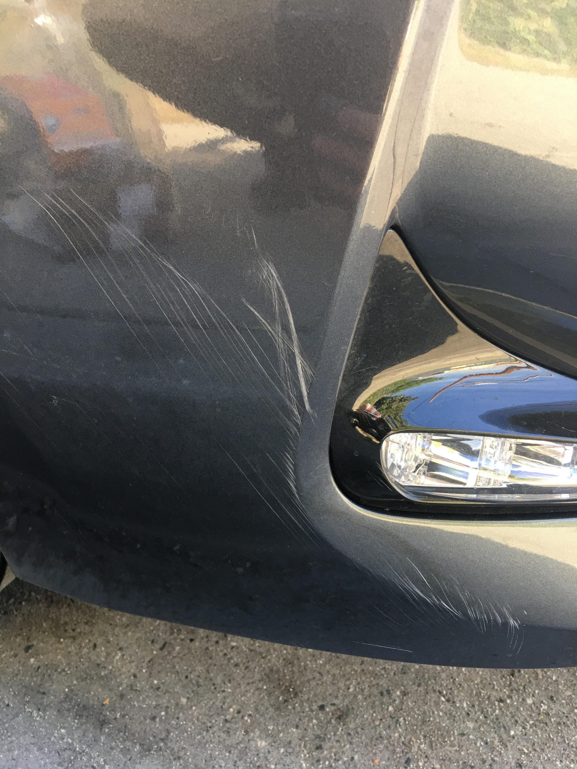 Anyone know how to get rid of scratches on a car? : howto