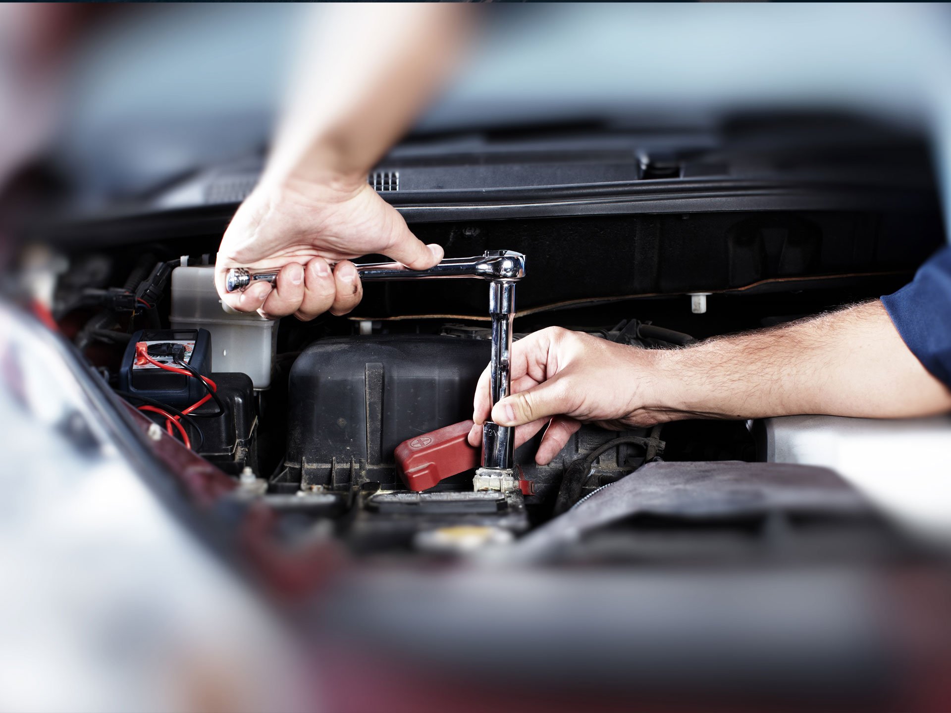 How does a car battery work and how is it constructed?
