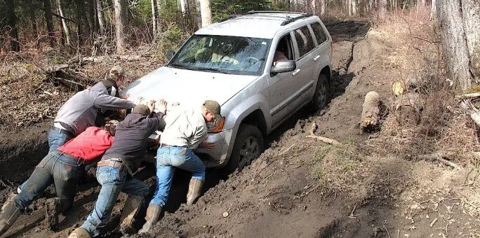 How to Get Out of Mud Without a Winch?