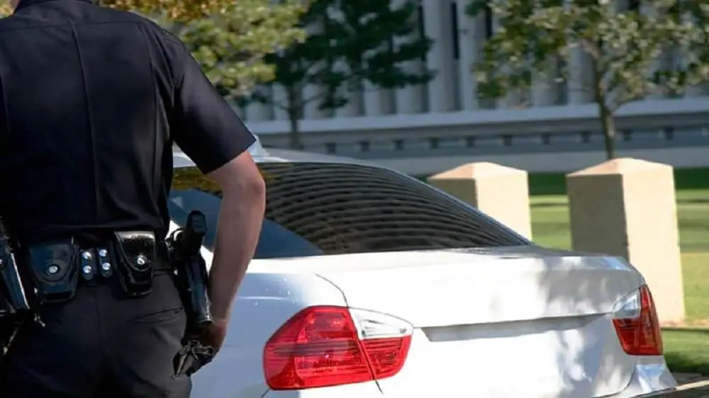Why do Cops Touch the Back of Your Car?